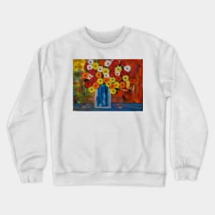 A beautiful bouquet of mixed flowers in a glass vase Crewneck Sweatshirt